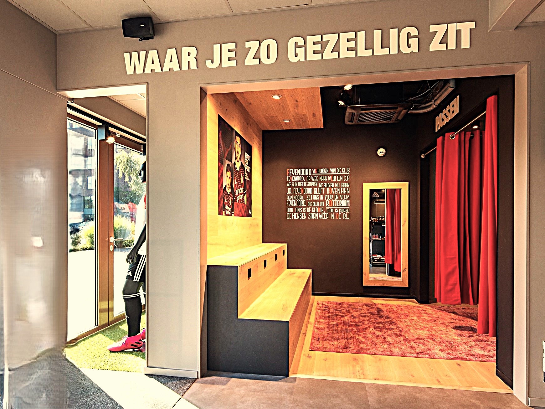 Feyenoord store entrance with red curtain and bench